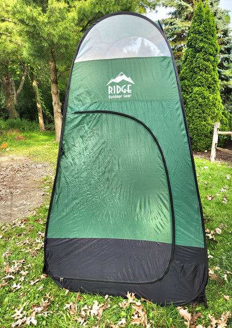 Portable Ridge Outdoor Gear privacy tent in green and black, ideal for outdoor showering or changing during your RV rental adventure.