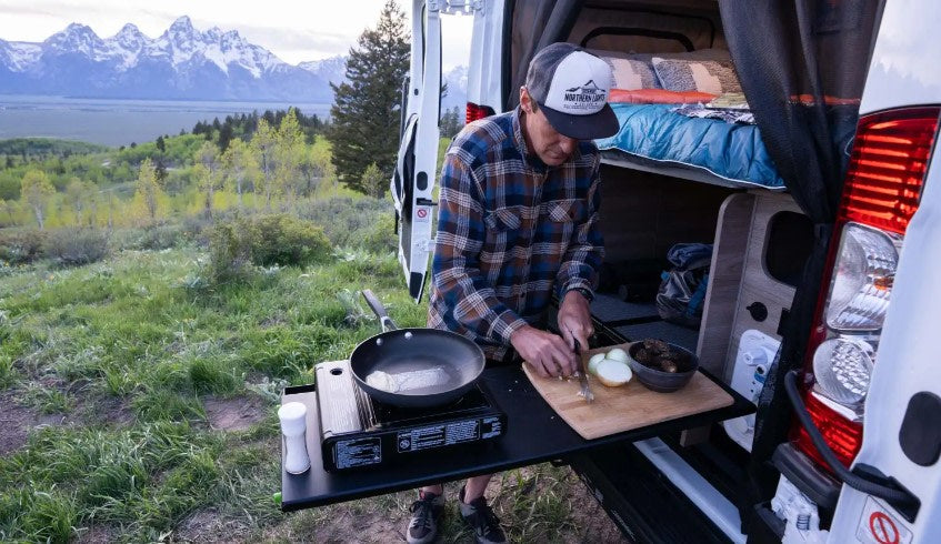  perfect for park adventures.|An open camper van for rv rental — photo 7