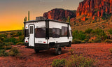 Wayfinder Go Lite travel trailer in a vibrant desert with saguaro cacti and red mountains. Your next rv rental adventure starts here!