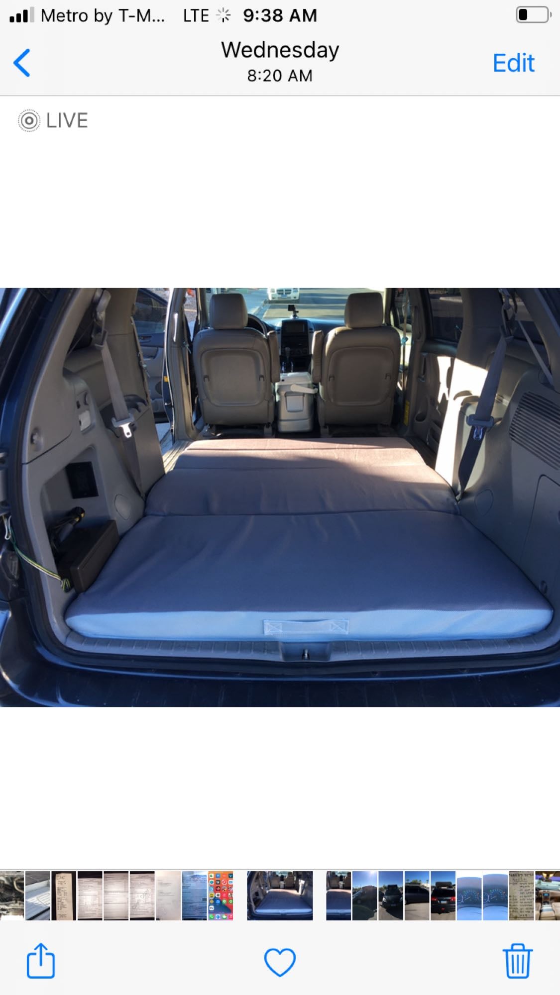  an RV rental parked on a sunny street.|RV rental outdoor setup: Vehicle with awning — photo 12
