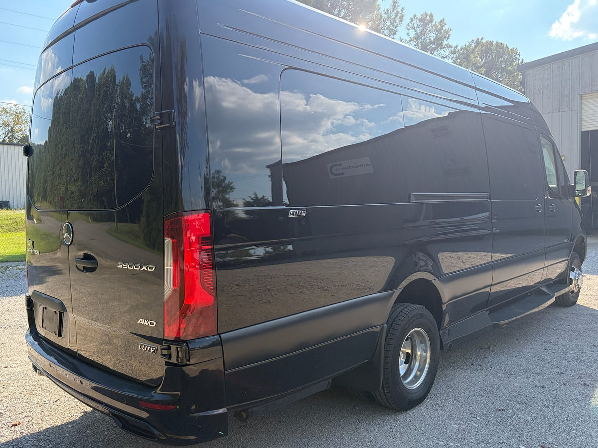  and custom grille.|Black Mercedes-Benz Sprinter LUXE van — photo 5