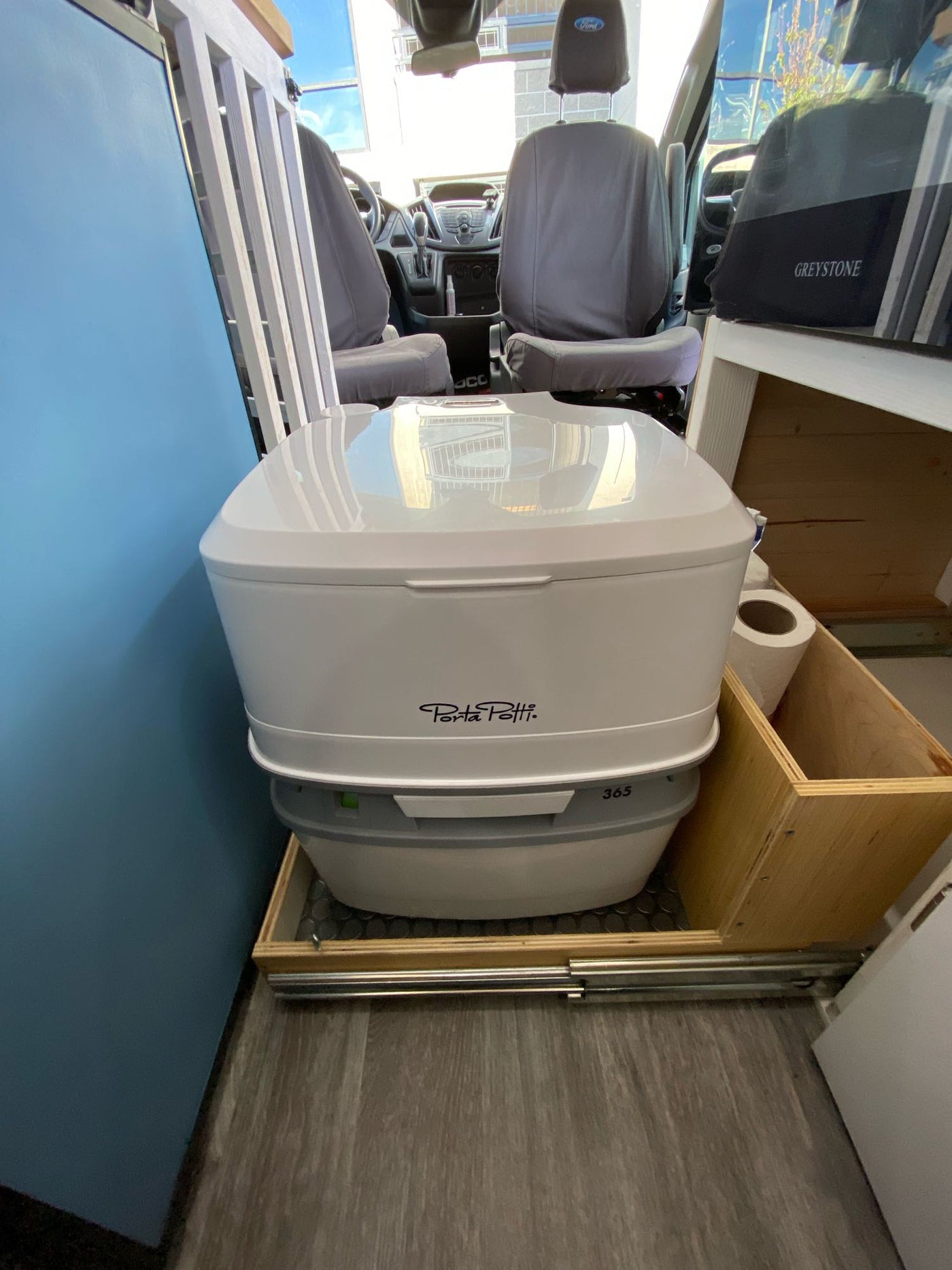  and cactus window curtains. Perfect for travel.|Inside an RV rental: a compact yet functional camper van kitchen with stove — photo 4