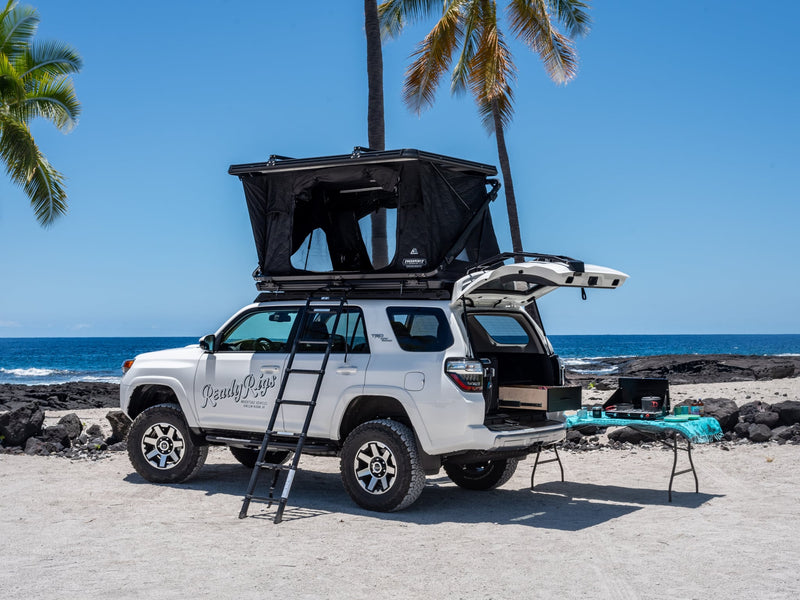 RV rental: White SUV with rooftop tent — photo 1