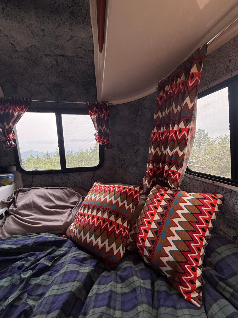 showcasing a comfy bed with plaid comforter — photo 5