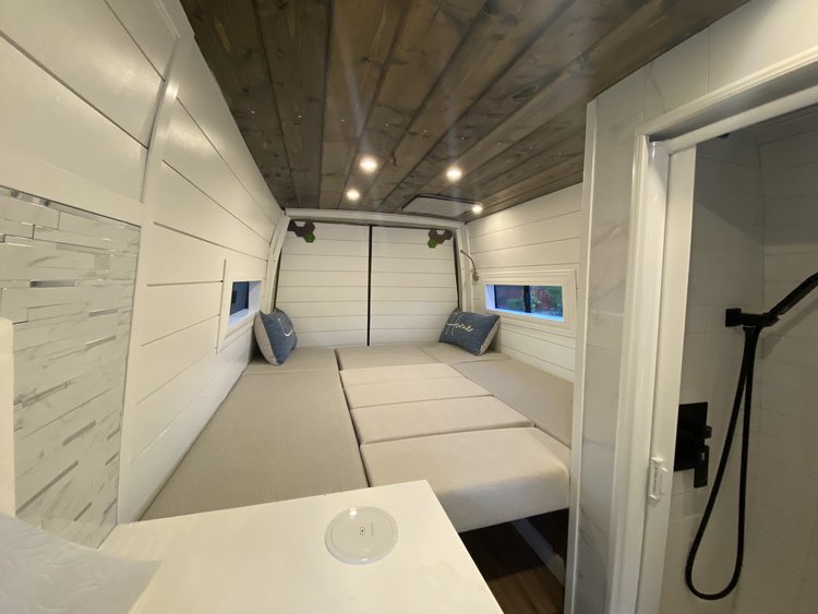  and warm lighting.|RV rental cargo area: A deep — photo 20
