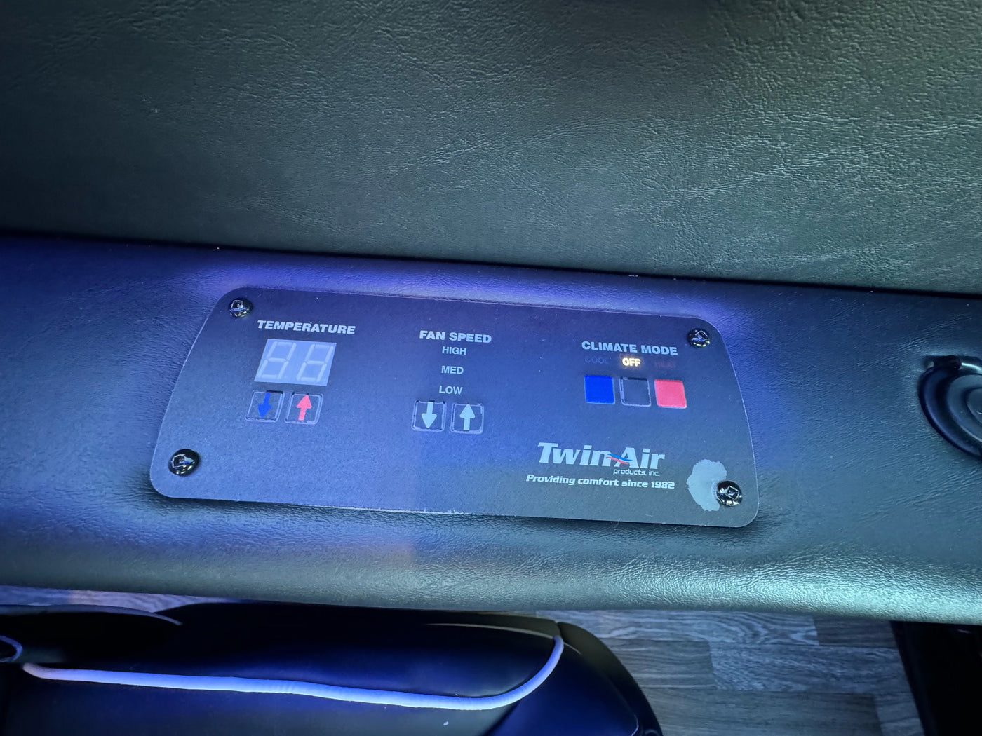  and ambient blue LED lighting.|This RV rental offers a luxurious interior with plush quilted seating — photo 6