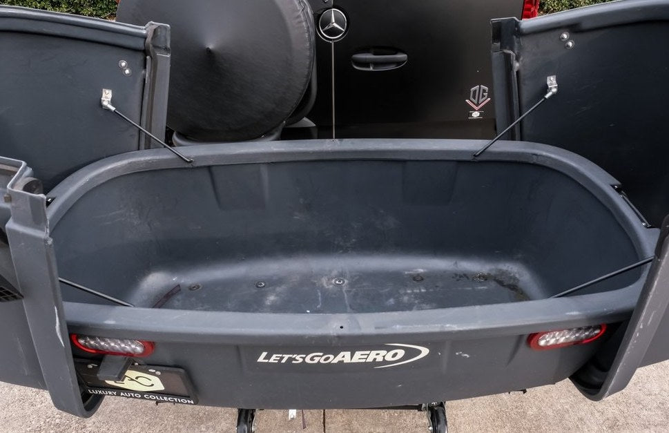 Open LetsGoAERO cargo carrier on a vehicle, ideal for RV rental trips. Provides extra gear storage for your adventure.