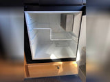 Empty mini-fridge in an RV rental, ready for your road trip snacks and drinks.