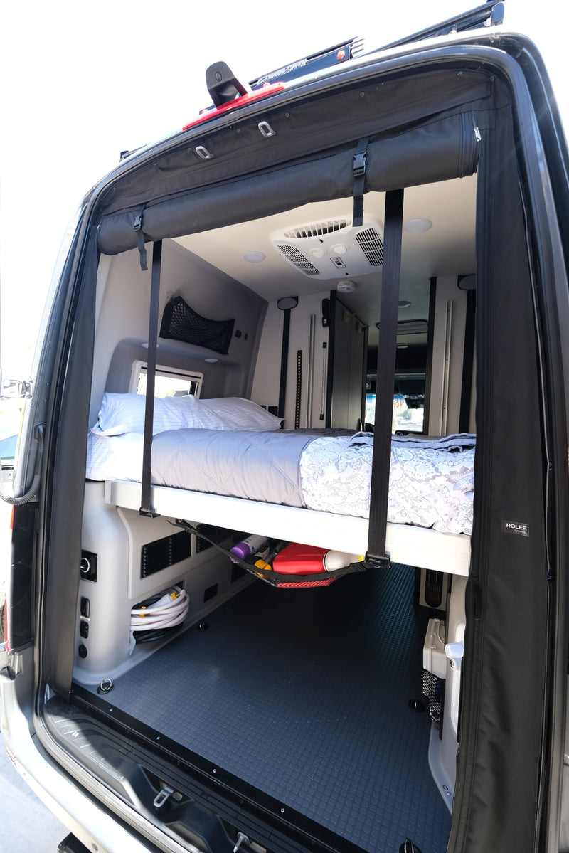  and lush forests. Perfect for an RV rental adventure!|This RV rental compact kitchen features an open fridge — photo 15