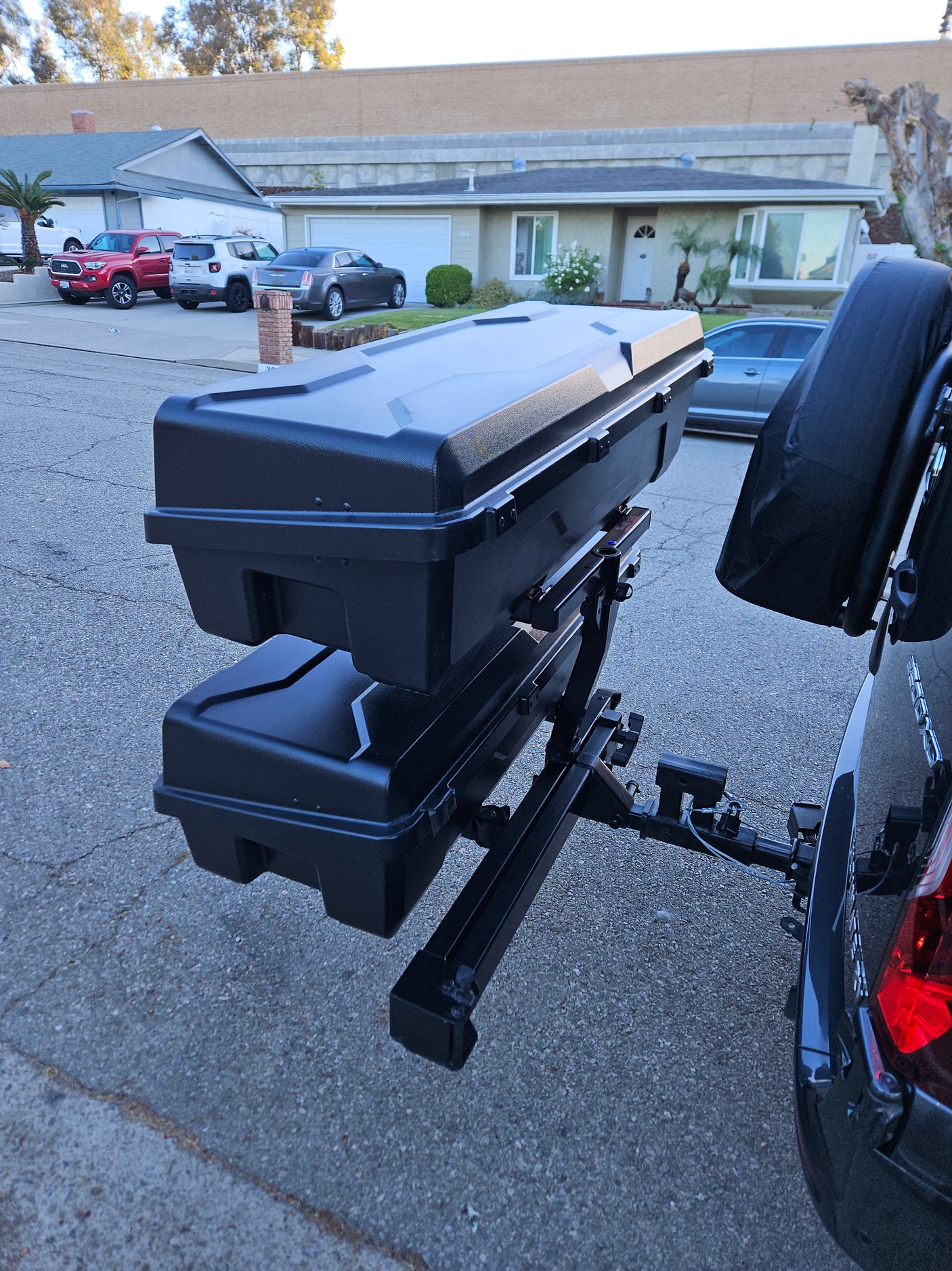 RV rental ready: Vehicle features a two-tier hitch-mounted cargo storage system for extended travel and gear.