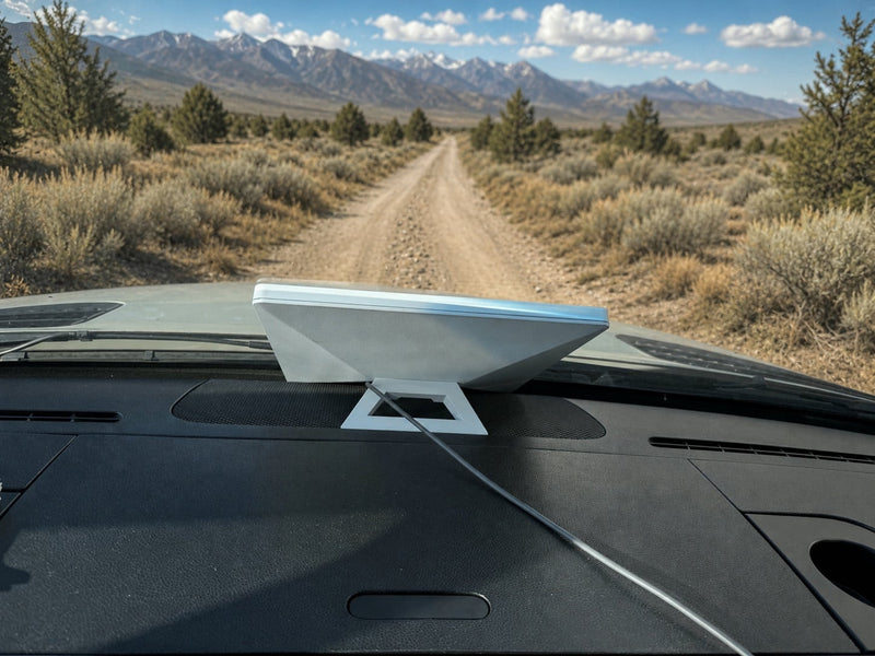  built-in storage & textured wall.|Stunning RV rental view: National Park map on a counter overlooking a mountain lake at sunset. Perfect adventure planning!|Grey RV rental camper van with bikes parked before impressive — photo 16