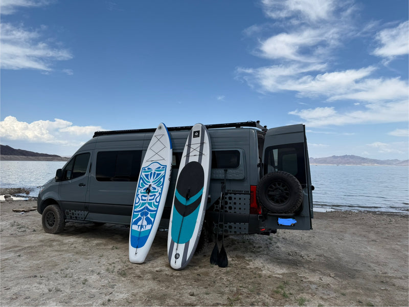  featuring custom cabinetry and large windows for scenic views.|RV rental interior view: bunk beds — photo 2