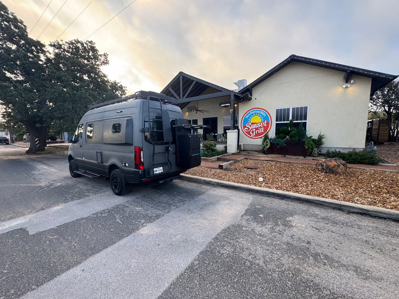  dark grey van with off-road tires — photo 16