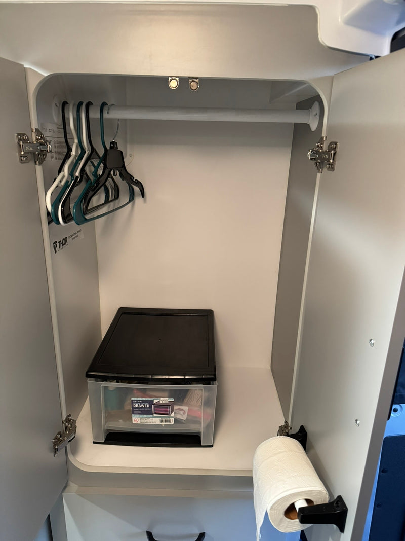  and handheld shower.|RV rental interior: cockpit — photo 9