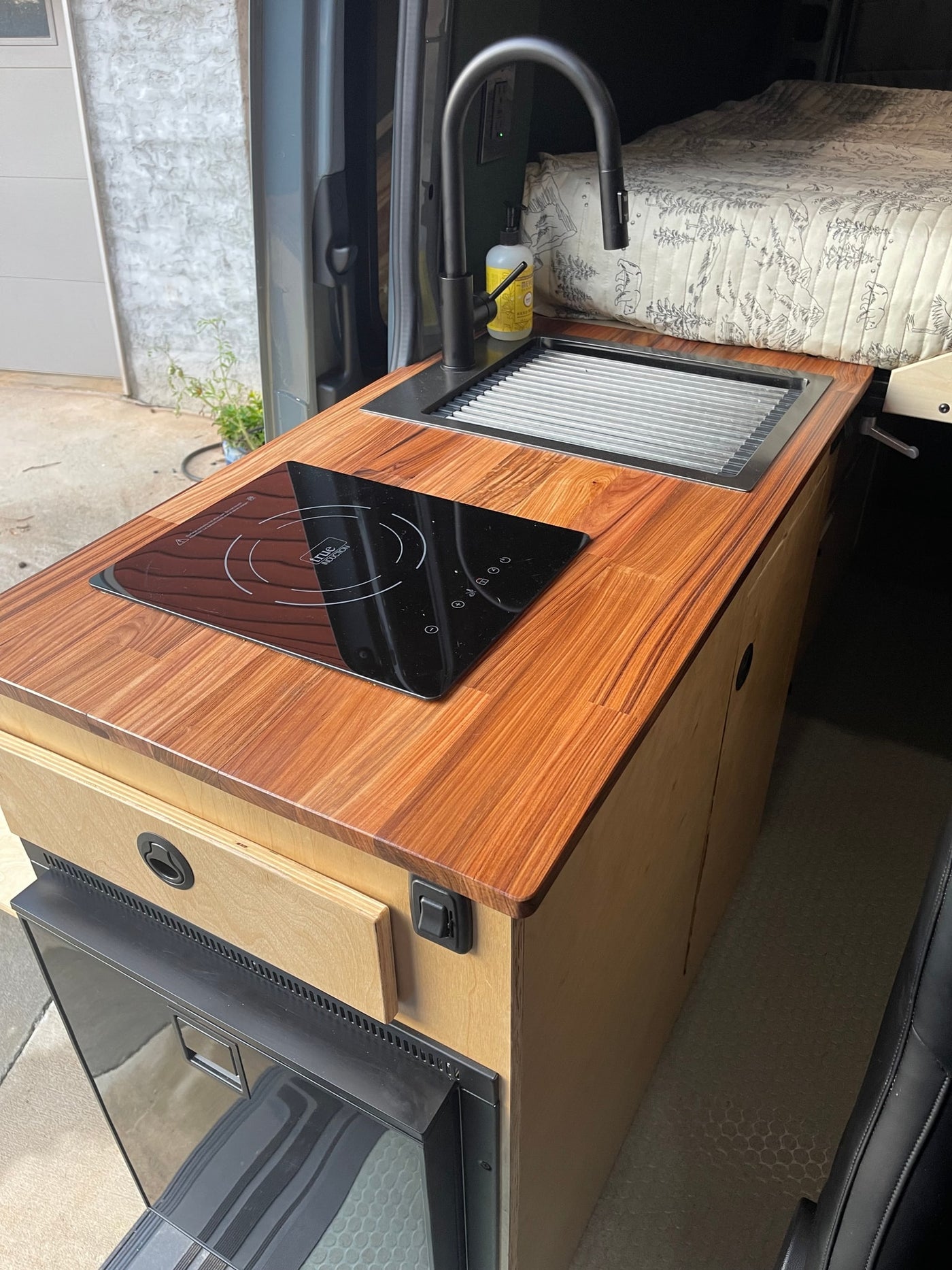  and seating area.|RV rental interior: Mercedes-Benz van with swivel seats — photo 8