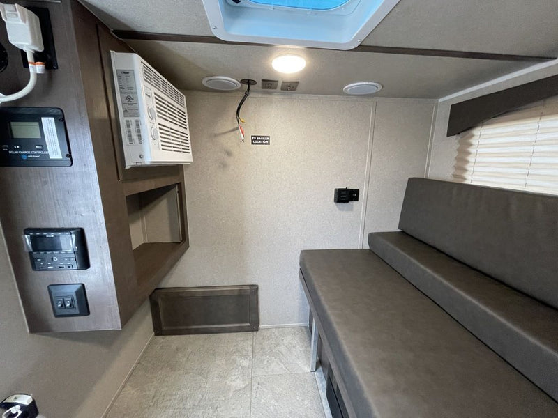  and smart storage solutions.|This RV rental floor plan shows a compact camper's interior with a kitchenette (sink — photo 3