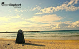 Green Elephant portable tent on a beach, ideal for outdoor privacy near your RV rental for changing or showering.