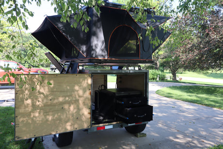  a unique RV rental alternative with a deployed rooftop tent