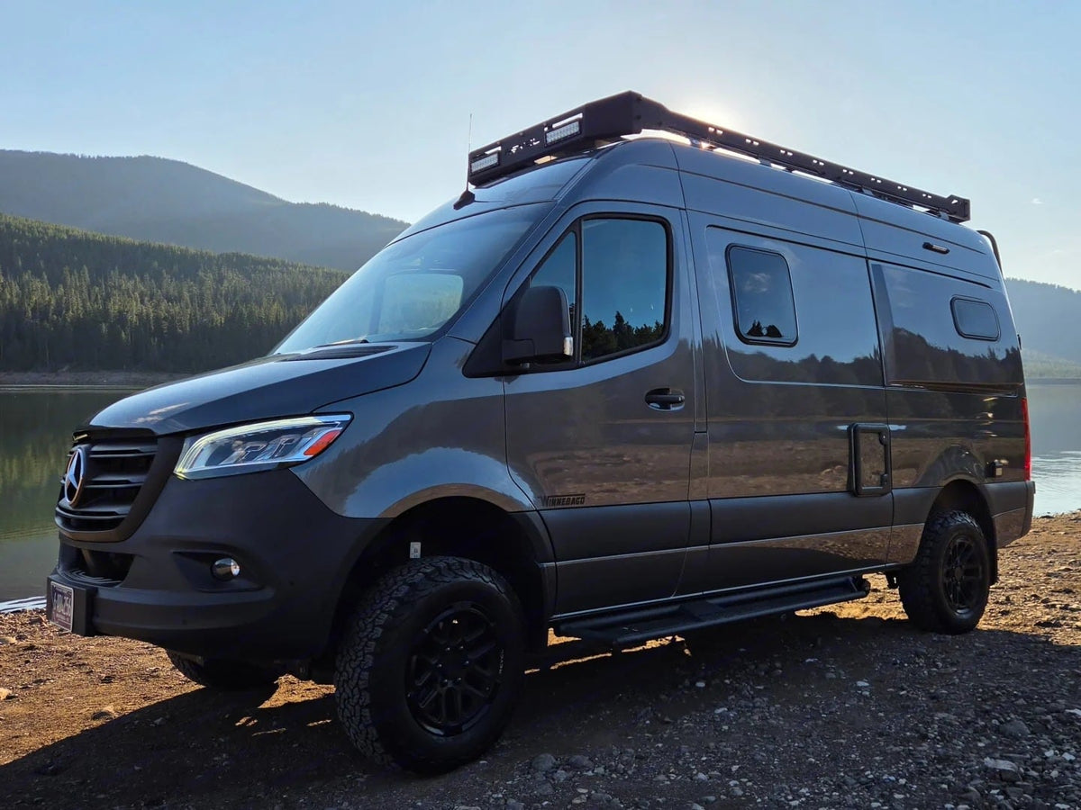  ready for your RV rental adventure.|Mercedes Sprinter rv rental camper van by a scenic lake & mountains — photo 2
