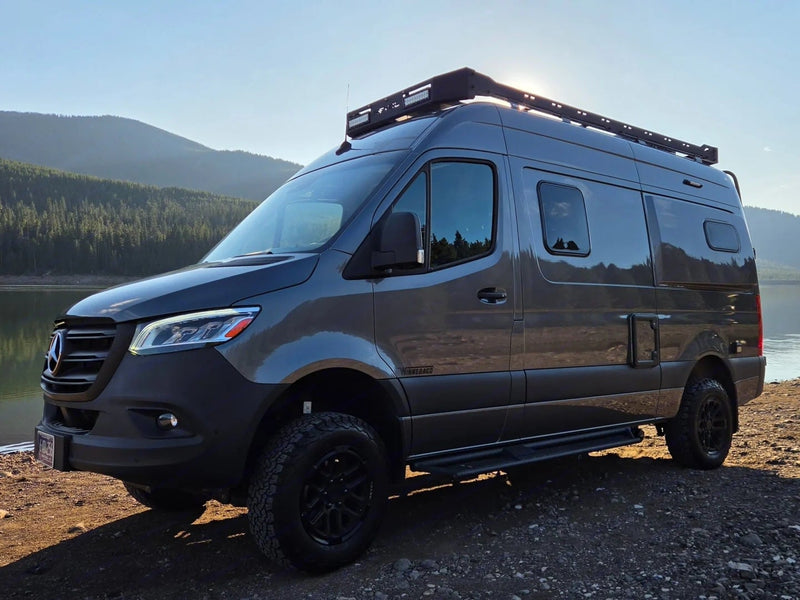  ready for your RV rental adventure.|Mercedes Sprinter rv rental camper van by a scenic lake & mountains — photo 2