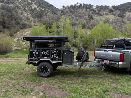 Graveller overland trailer & Toyota Tundra with Thule tent. Ready for adventure, a rugged RV rental alternative for off-grid trips.