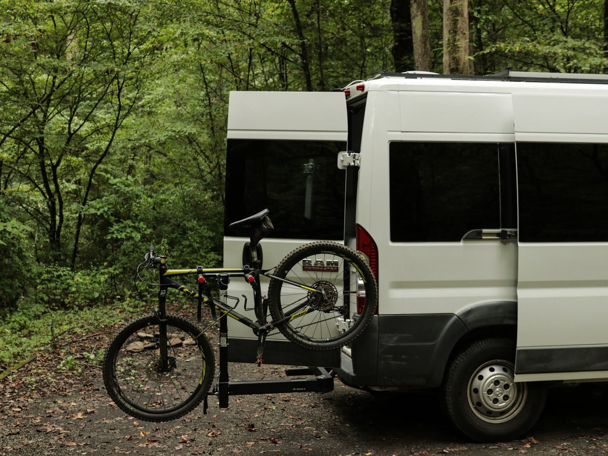  with a natural view outside.|Morning coffee setup in an rv rental van: a grey pot — photo 9