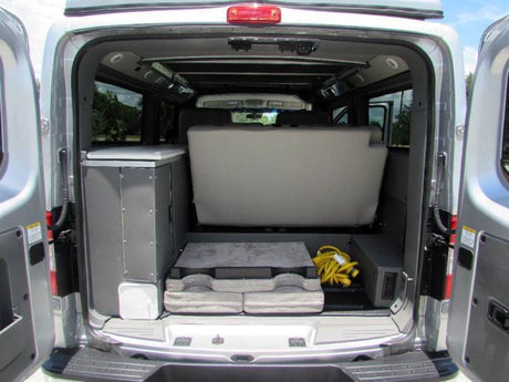  and adventure gear.|Silver custom off-road van