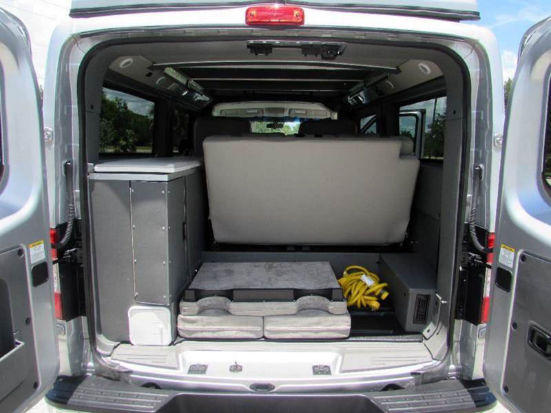  and adventure gear.|Silver custom off-road van — photo 17