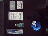 Assorted travel toiletries, including wipes, soap, and bath sponges, neatly organized for an RV rental trip.