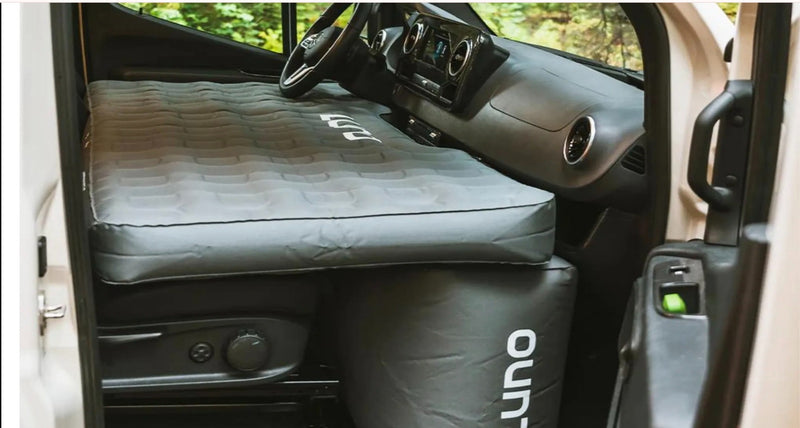  and open mini-fridge. Practical interior for adventurers.|Inside this modern RV rental: a flexible slatted bed system — photo 10