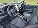 Modern Subaru car interior showing dashboard, steering wheel, and infotainment screen. Comfortable for any RV rental journey.