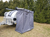 RV rental: a grey teardrop camper with attached Joolca privacy/shower tent, ready for camping.