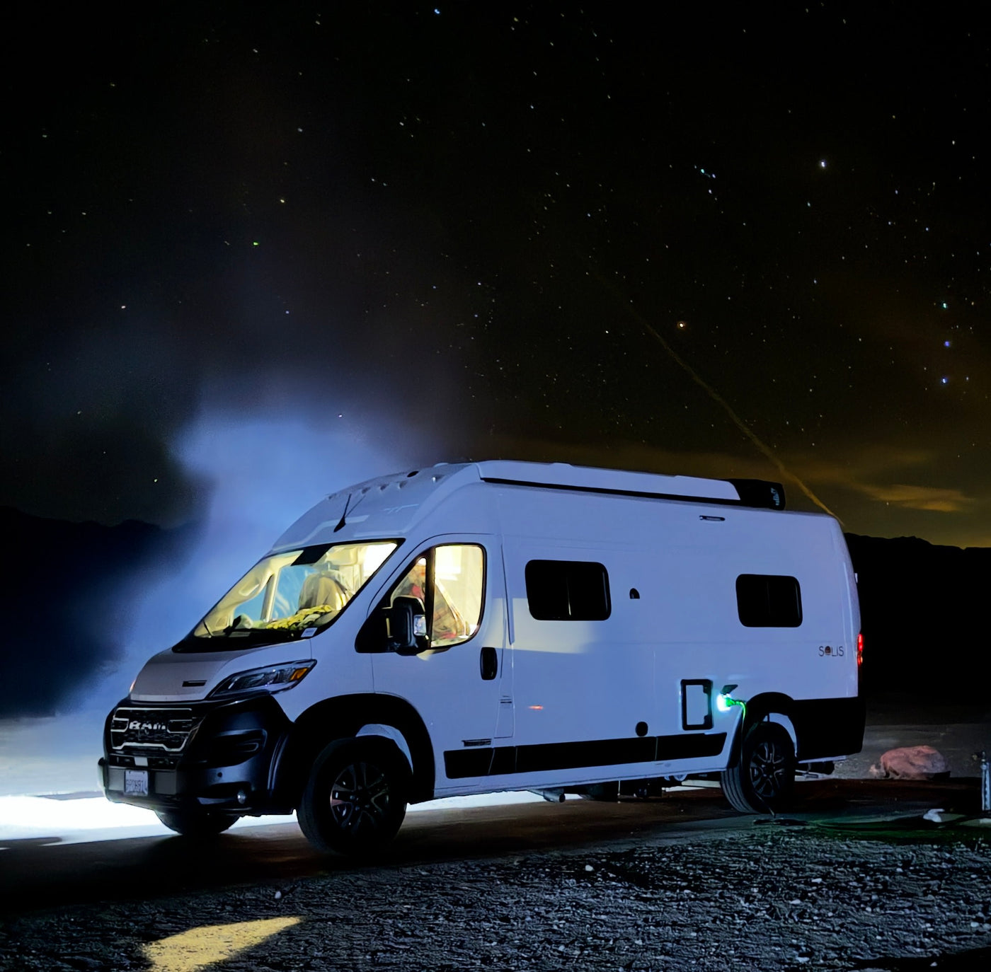  is parked in a rugged desert mountain landscape — photo 4