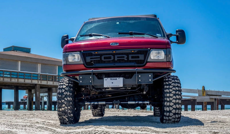  ideal for an rv rental adventure.|This lifted red Ford van — photo 2