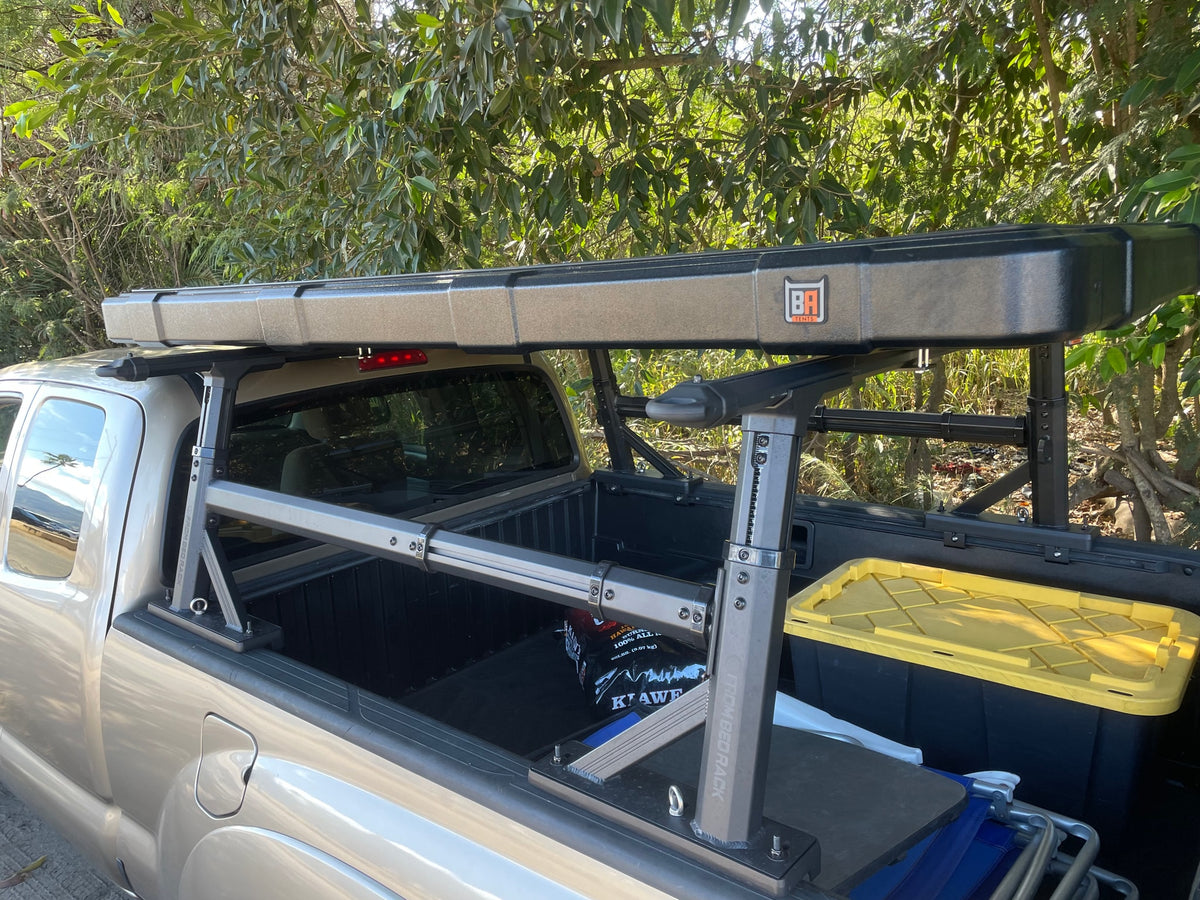 Truck equipped with 'From Bed Rack' and a 'BA Tents' rooftop tent, an ideal RV rental alternative for your overland adventure. — photo 20