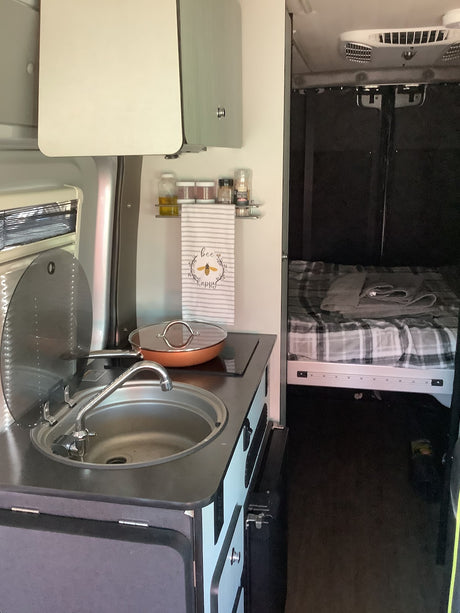  ready for adventure.|Cozy RV rental interior with a bed