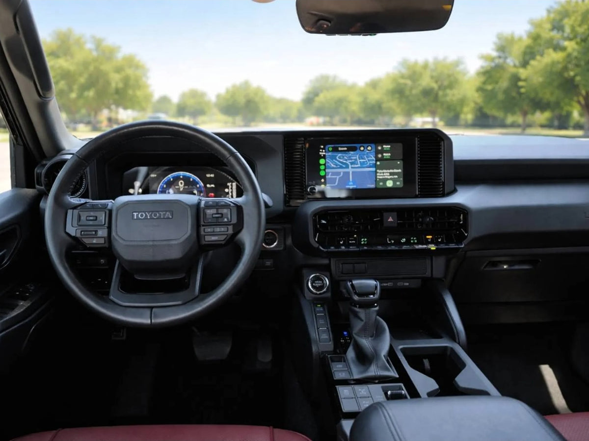  infotainment. Ideal comfort for your next rv rental adventure.|Spacious car interior with vibrant red seats — photo 6
