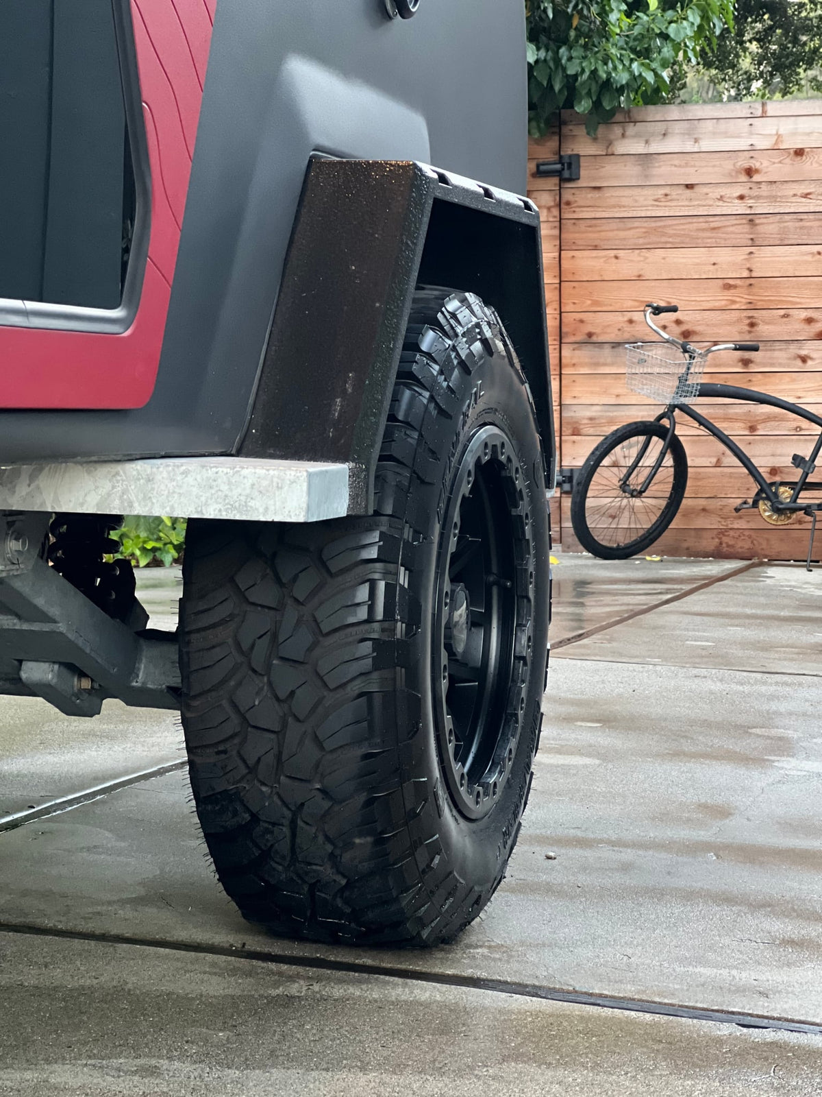  and fridge.|Extending iKamper ladder and dark gray RV rental unit. Steps are fabric — photo 8