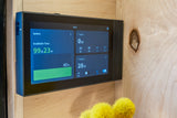 An EcoFlow power display mounted on wood in an rv rental, showing 40% battery, 99 days runtime, and 28W DC output.