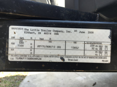 Trailer spec data plate for rv rental, showing GVWR, tire size, and VIN. From June 2008.