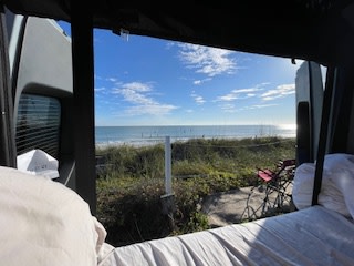  a sleek gray camper van — photo 10