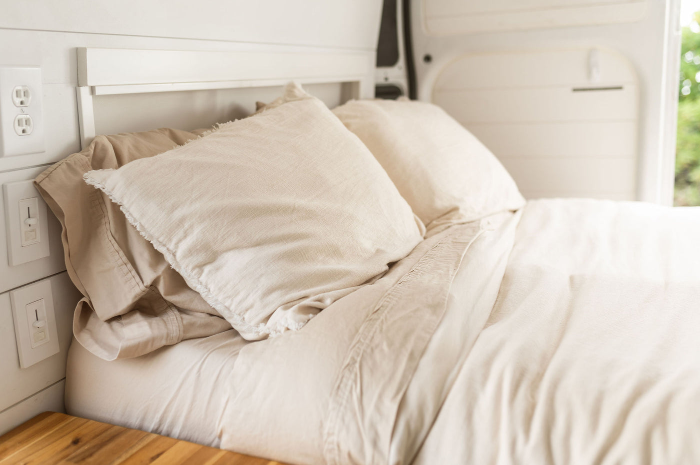  and a comfy bed. Perfect for van life adventures.|Experience van life! This RV rental features a cozy bed — photo 4