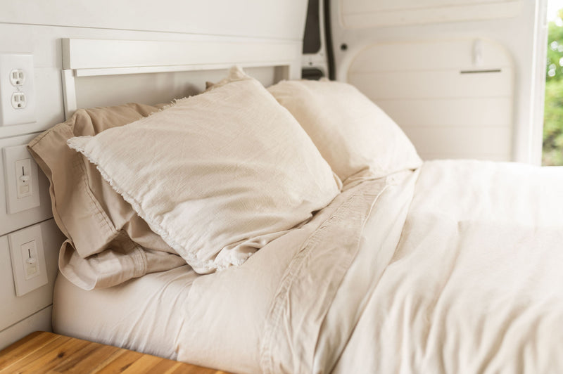 and a comfy bed. Perfect for van life adventures.|Experience van life! This RV rental features a cozy bed — photo 4