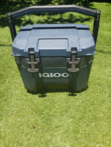 Sturdy Igloo cooler on bright green turf, perfect for your next rv rental outdoor adventure.