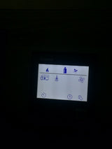 RV rental Truma control panel displaying icons for climate, propane, heat, and engine functions.