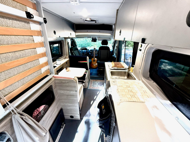  ideal for mobile living adventure.|Cozy RV rental interior with kitchen — photo 8
