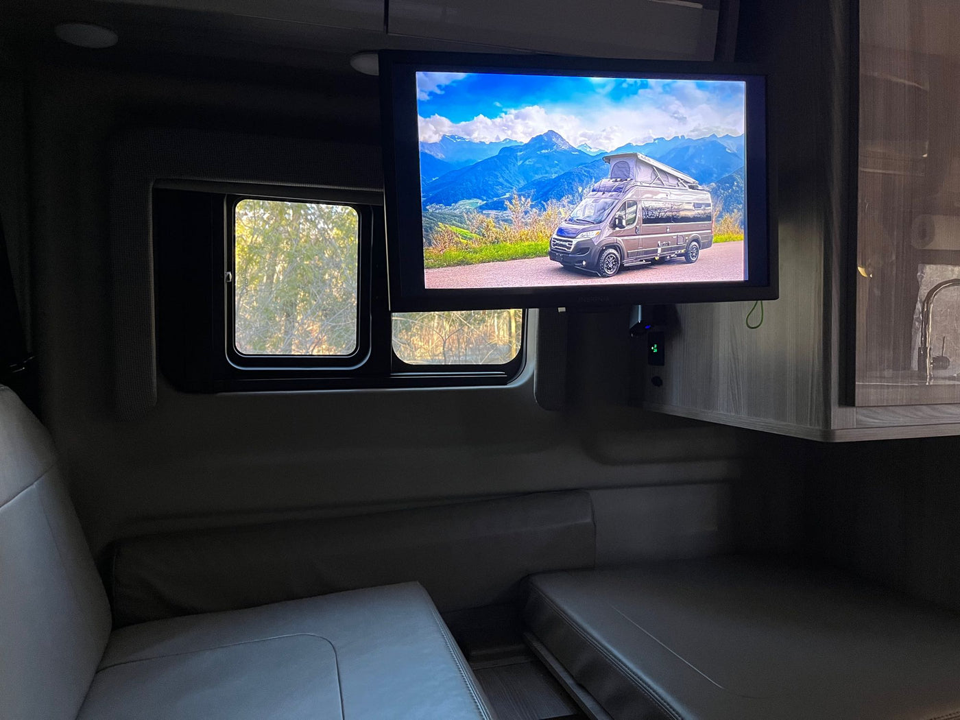  and nature.|Spacious rv rental interior features a kitchen counter with fruit — photo 17