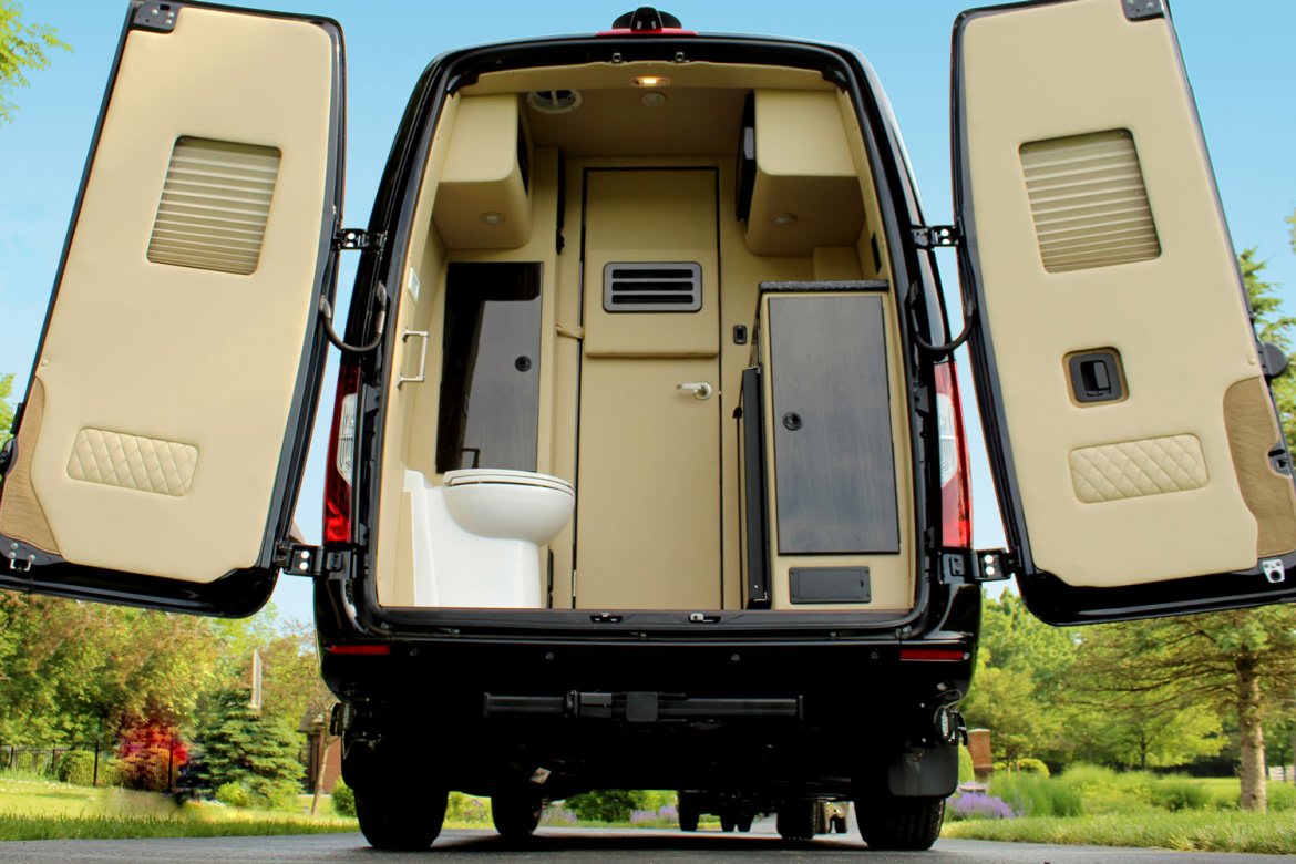  perfect for comfortable travel.|RV rental interior: Compact kitchen with sleek microwave — photo 6