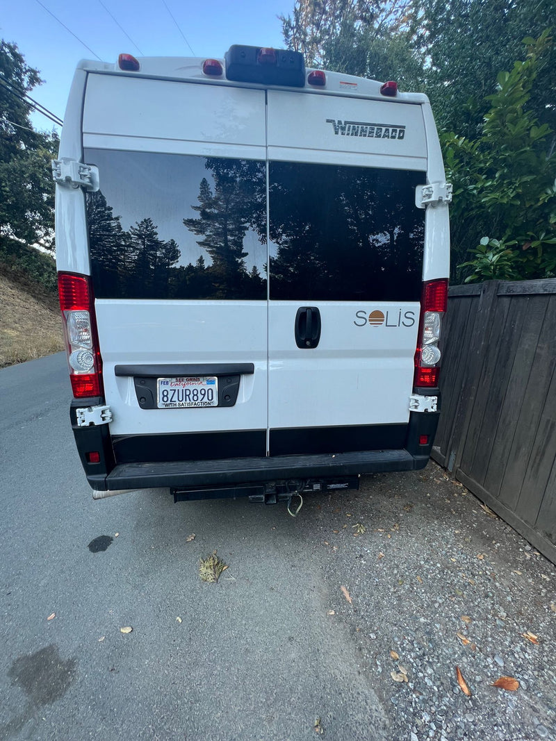  and smart storage solutions for travel. Ideal for a camper van adventure.|Compact RV rental wet bath featuring a toilet — photo 15