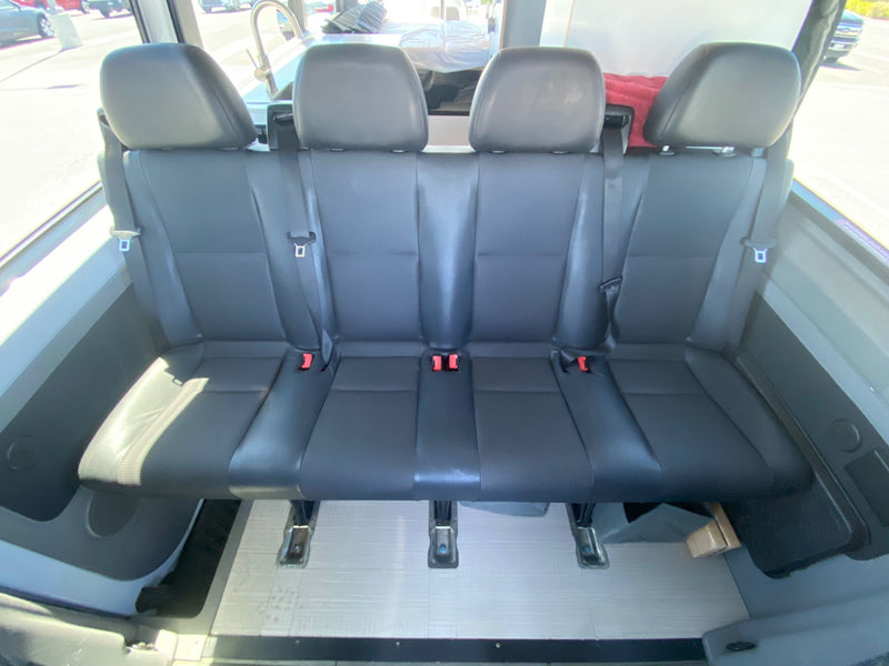  and padded window cover.|Inside an rv rental van: a comfortable bed setup — photo 6